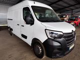 a picture of a white van parked in a garage
