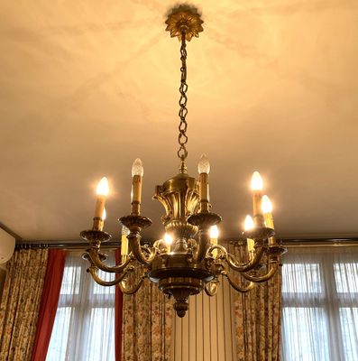 Important lustre en métal doré à 10 bras de lumière. H : env…