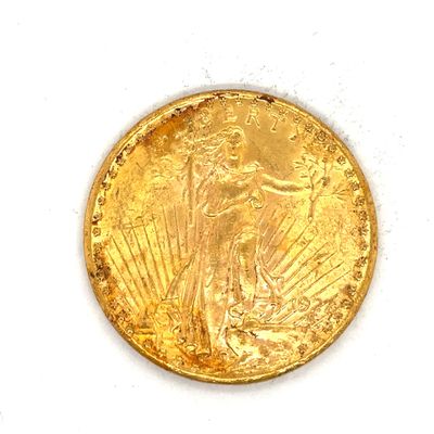 une image d'une pièce d'or sur une surface blanche