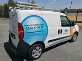 a van that is parked in the parking lot