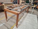 an image of a table made out of wood and metal