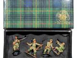 des petits soldats dans une boîte, sur fond blanc avec un motif tartan en arrière-plan