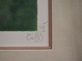 painting of a green square with a brown border in a frame