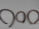 three different types of whips are shown on a white surface