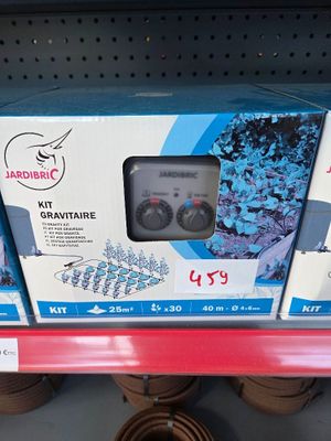 a box of water on the shelf of a store