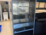 an image of a commercial refrigerator in a kitchen