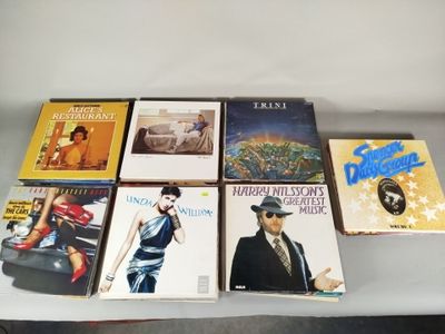 a lot of books that are on a table