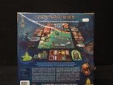 the box of the board game has a picture of a man on it