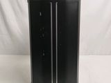 an image of a black computer tower sitting on top of a white table
