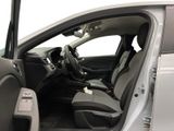 the interior of a car with the door open and the driver ' s seat down