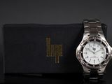an image of a watch sitting on top of a black box