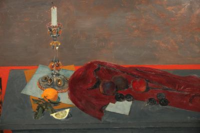un tableau représentant une orange et une bougie posées sur une table