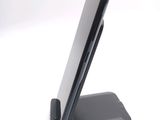 a cell phone that is sitting on top of a stand