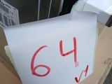 a piece of paper taped to the door of a microwave