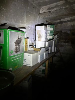 many boxes on a table in a dark room