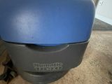 a close up of a vacuum cleaner on the floor in a room
