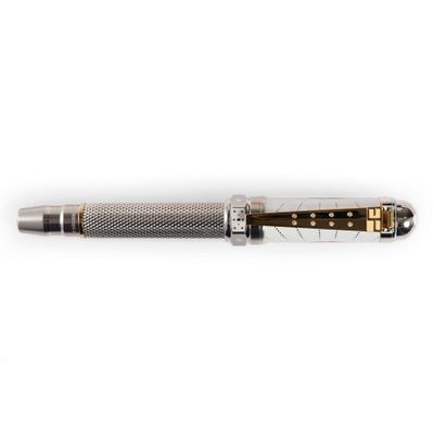 the pen is silver and gold with a black and white stripe