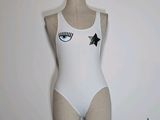 a white bodysuit with a black star on it