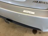 a close up of a car with a sticker on it ' s bumper