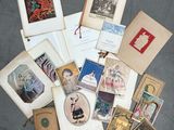 a pile of old books with pictures on them