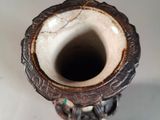 a small vase that is sitting on a table