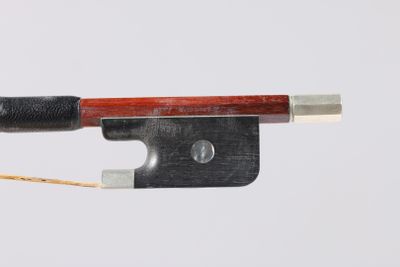 the bow is made of wood and has a black handle