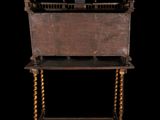 a small wooden table with a wooden top on a black background