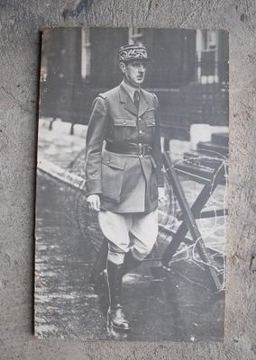 a black and white photo of a man in a military uniform