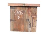 a wooden box with writing on it with a white background