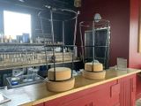 two baskets of cheese on a counter in a restaurant