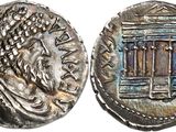 a silver coin with an image of a man on it