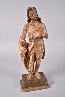 an image of a statue of a man holding a basket