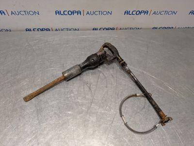 an image of a hammer and a wren on a table