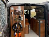 a van that has a kitchen in the back of it