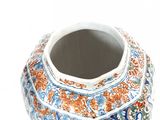 an image of a vase with a floral design on it