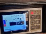 a close up of a digital clock on a bike