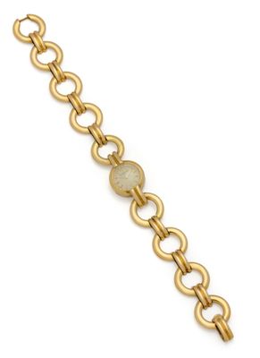 un bracelet en or composé de maillons ovales et de maillons ovales
