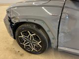 a close up of a car with a denting on it