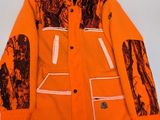 an orange jacket with a camouflage print on it
