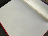 an open book with a picture of a man and a woman on it