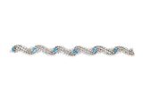 un bracelet en diamants et topazes bleues