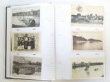 a book with pictures of people and boats on it