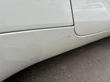 a close up of a car ' s door handle and the door handle is missing