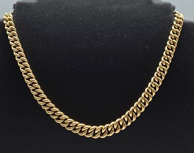 a gold chain necklace on a mannequin mannequin mannequin mannequin mannequin mannequin mannequin mannequin manne