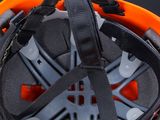 a close up of a helmet on a black background