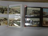 a lot of pictures on the wall of a room