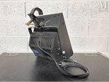 an image of a portable welding machine on a table