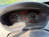 a close up of a car dashboard with a speedometer and gauges