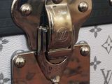 a close up of a suitcase with a lock on it