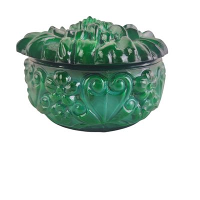 an image of a green glass bowl on a white background